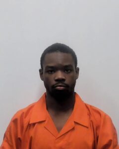 PHOTO School Shooter Jaquez Myrick Very Serious Face Mugshot While In Orange Jumpsuit