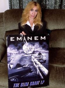 PHOTO Eminem's Mom Holding Eminem Poster In Her House Being Proud Of Her Son