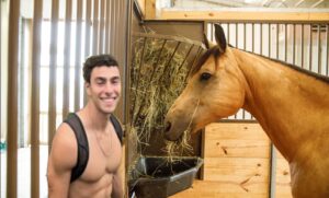 PHOTO Luigi Mangione Feeding A Horse