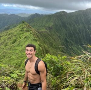 PHOTO Luigi Mangione Hiking Overseas Shirtless On A Very High Mountain