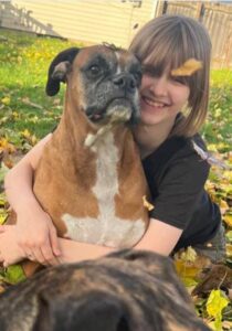 PHOTO Natalie Rupnow Hugging The Family Dog