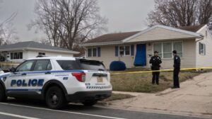 PHOTO Police Put Bag Over Front Door Of Natalie Rupnow's Parents House After Breaking It Down