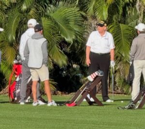 PHOTO Donald Trump's Stomach Hanging Out Of Shirt At Miami Golf Course While Hitting The Links