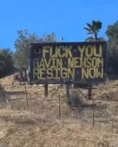 PHOTO F*ck You Gavin Newsom Resign Now Billboard On The Side Of The Road In California