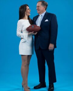 PHOTO Bill Belichick's Girl Looking Very Small Holding An Official NFL Football