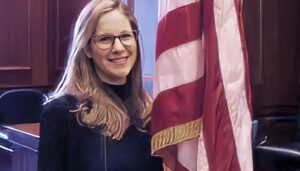 PHOTO Danielle Sassoon Clutching The America Flag For All She's Got