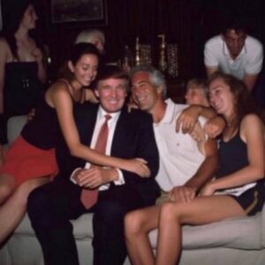 PHOTO Donald Trump And Jeffrey Epstein Sitting On A Couch With Some Young Looking Girls Draped Across Their Arms