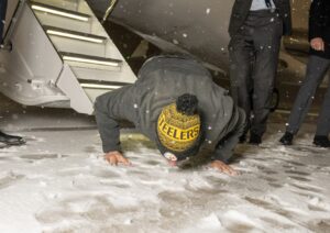 PHOTO Marc Fogel Kissing The Ground After Being Released From Russia