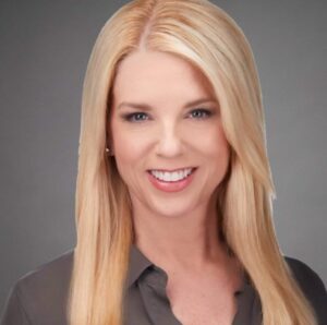 PHOTO Pam Bondi's Bleached Blonde Hair And Dark Roots