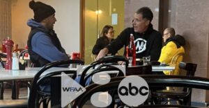 PHOTO Rob Pelinka With Patrick Dumont Discussing Luka Doncic Trade In Coffee Shop