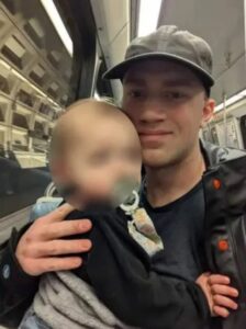 PHOTO Ryan O’ Hara On Public Transportation With His Son Using A Binky