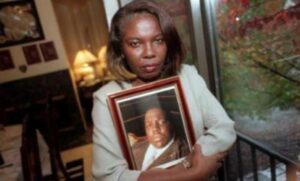 PHOTO Voletta Wallace Holding A Framed Picture Of Her Son