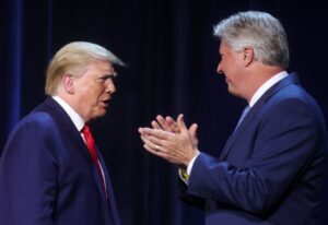 PHOTO Robert Morris Clapping For Donald Trump