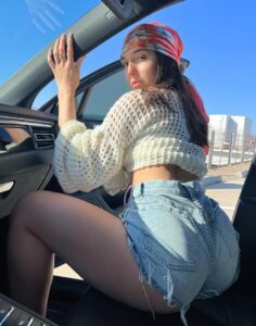 PHOTO Gabriella Zuniga Driving A Very Modest SUV Before Meeting Shannon Sharpe