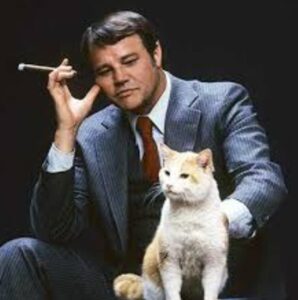 PHOTO Joe Don Baker Smoking A Cigarette With His Cat