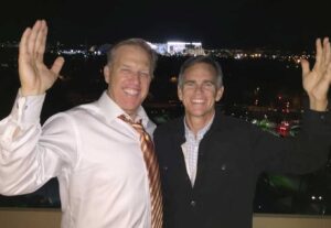 PHOTO John Elway Smiling Outside Mile High Field With Jeff Sperbeck
