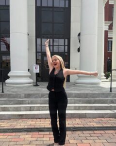 PHOTO Kayla Malec Celebrating A Win Outside The Courthouse