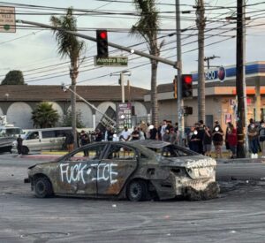 PHOTO Burned Up Car In Los Angeles With F*ck Ice Graffitied On Its Side