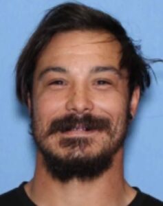 PHOTO Crazy Travis Decker Smiling In His Mugshot