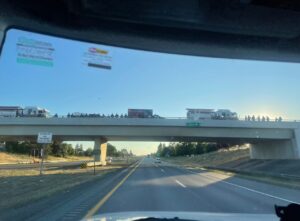PHOTO Overpasses Between Spokane WA And Coeur d’Alene Idaho Filled With First Responders Awaiting Send Off To Fallen Firefighters In Idaho