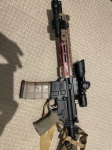 PHOTO Close Up Of Shane Tamura's Gun Covered In Blood