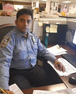 PHOTO Didarul Islam Working At His Computer In His Office
