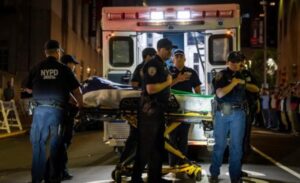 PHOTO Didarul Islam's Body Covered In American Flag While He Was Put In Ambulance