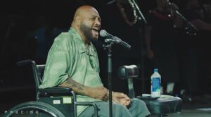 PHOTO George Fiji Veikoso Singing From His Wheelchair