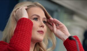 PHOTO Karoline Leavitt Holding Her Hair With Two Hands Because She Couldn't Take One More Question About Epstein