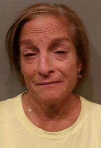 PHOTO Mary Lou Retton Smiling Like A Crook In Her Mugshot