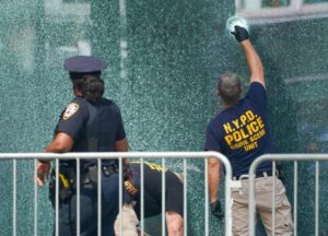 PHOTO NYPD Crime Scene Unit Looking At Holes In NYC Building From Mass Shooting