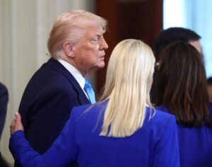PHOTO Pam Bondi Patting Donald Trump On The Back