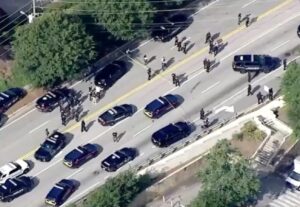 PHOTO 15 Law Enforcement Vehicles Surrounding Emory University Shooting Scene