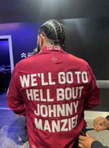 PHOTO Drake Wearing Red Polo That Says We'll Go To Hell About Johnny Manziel On The Back