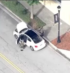 PHOTO Emery University Shooting Suspects Car Being Searched By Law Enforcement