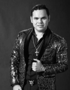 PHOTO Ernesto Barajas Wearing Cross Necklace