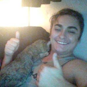PHOTO Ethan Nieneker Laying On The Couch With His Cat