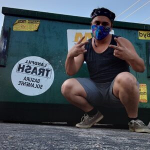 PHOTO Ethan Nieneker Posing For A Picture In Front Of A Dumpster