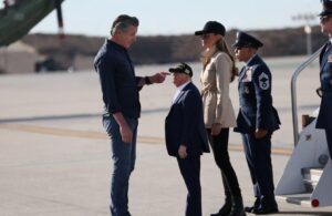 PHOTO Gavin Newsom Making Donald Trump Look Small On The Airplane Tarmack Of Air Force One