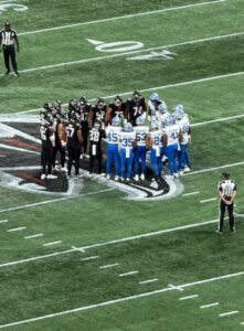 PHOTO Players Praying On The Field Before NFL Preseason Game Between Lions And Falcons Was Suspended