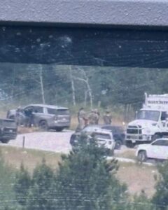 PHOTO US Marshalls Surrounding Michael Brown In Heavily Forested Area