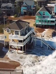 PHOTO Water Splashing Up Against Homes In North Carolina