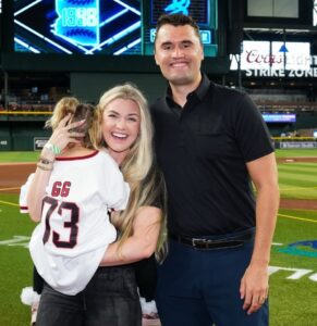 PHOTO Charlie Kirk On The Field At Houston Astros Game With His Wife And Daughter With Big Smile On His Face