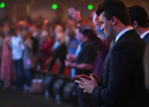 PHOTO Charlie Kirk With His Hands Together Praying At Church