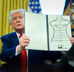 PHOTO Donald Trump Holding Up Birthday Card He Sent To Epstein In White House