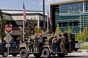 PHOTO Of Heavily Armed Sheriffs Searching For Charlie Kirk Shooter Outside UVU In Orem Utah