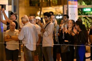 PHOTO Onlookers Taking Snapshots And Selfies At Lisbon Funicular Accident