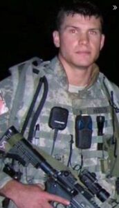 PHOTO Pete Hegseth Holding A Gun In Full Military Uniform