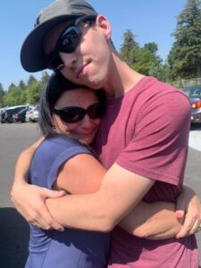 PHOTO Tyler Robinson Huggins His Mother