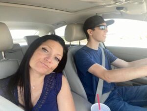PHOTO Tyler Robinson Smiling While Driving Around With His Mother